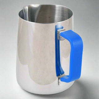 Stainless steel frothing jug with a blue handle on a gray background