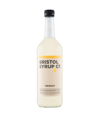 Bottle of Bristol Syrup Co. No.7 Orgeat almond syrup in a 750ml glass bottle for cocktails, summer coolers and iced coffee